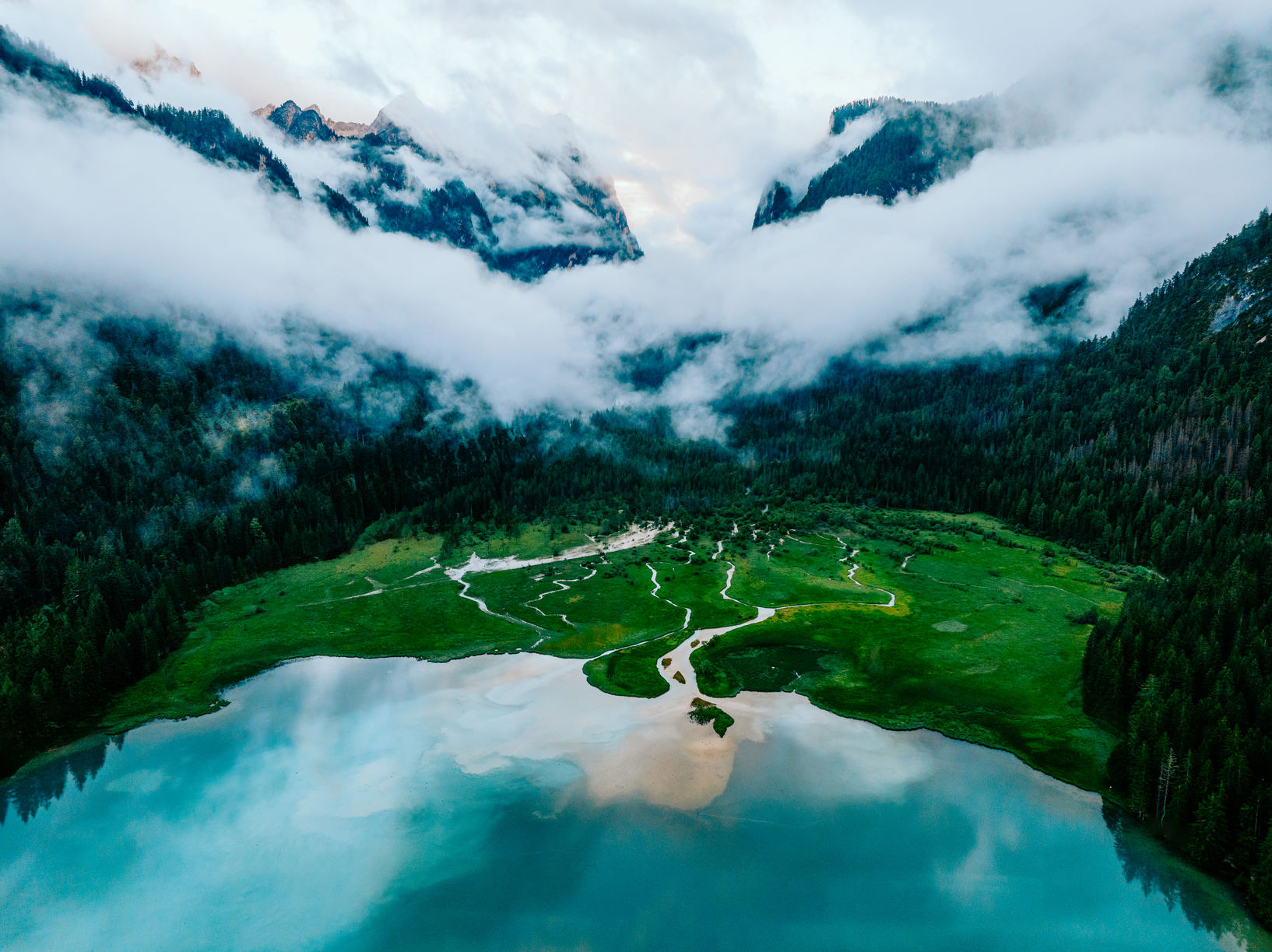 Dobbiaco lake in the clouds