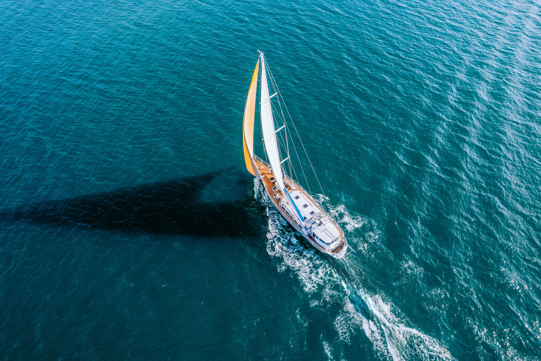 Aerial view of a boat sailing at sea
