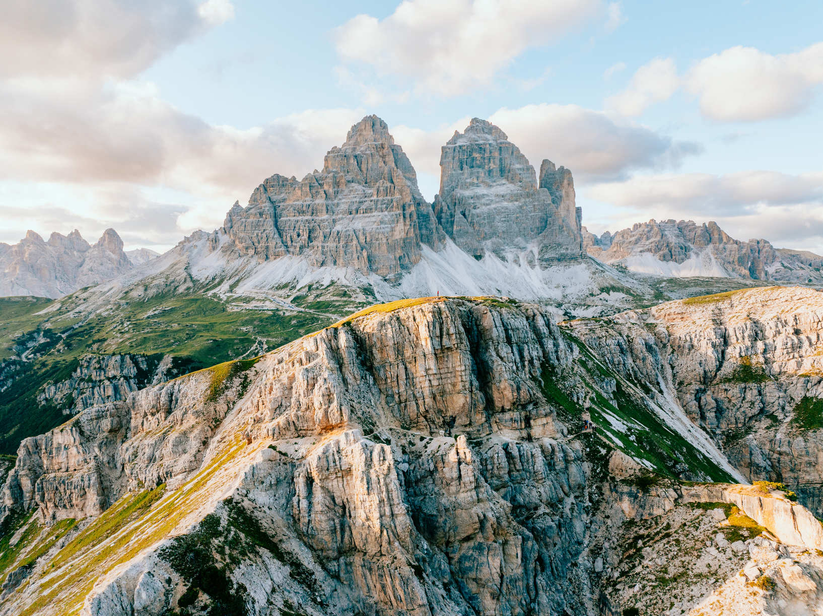 Hiking in front of dramatic mountains in the Italian dolomites